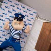 louie takes a picture at the photo booth